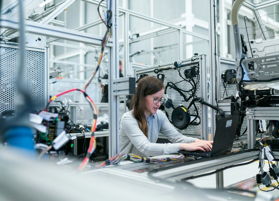 Engineer working in a solar manufacturing facility