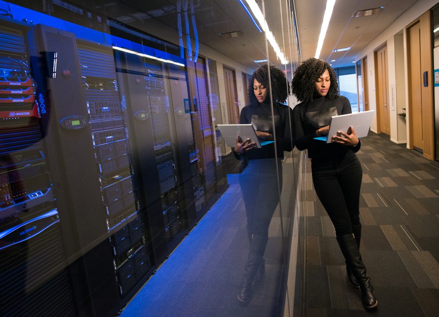 Engineer monitoring energy data on a tablet
